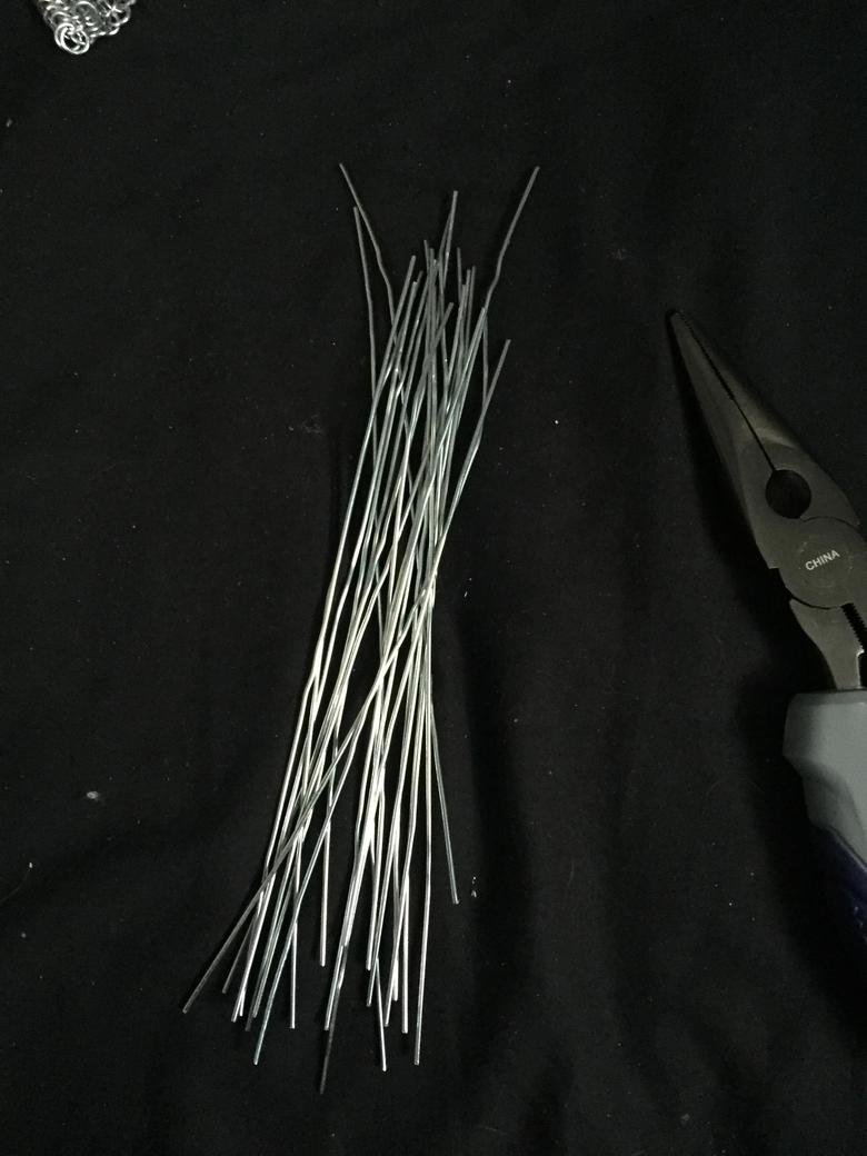 shamelessly stolen from imgur. After I posted my chainmail projects last night, ATimeTravellingRobotFromTheFuture asked how I made it from paperclips, and after